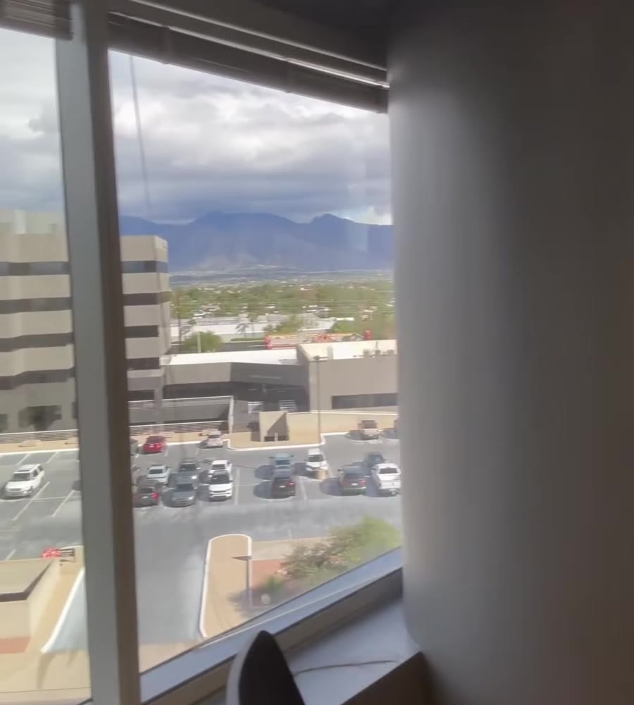 Office corner with floor to ceiling windows at the Williams Centre Collective in Tucson